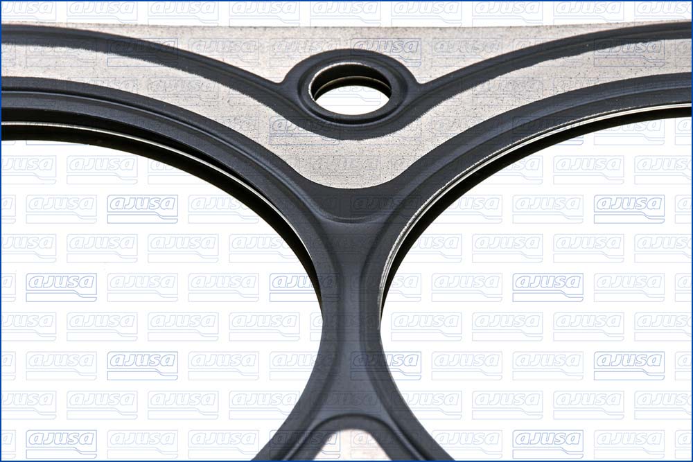 AJUSA Pakning, topstykke 10190100 venstre for FORD MAZDA