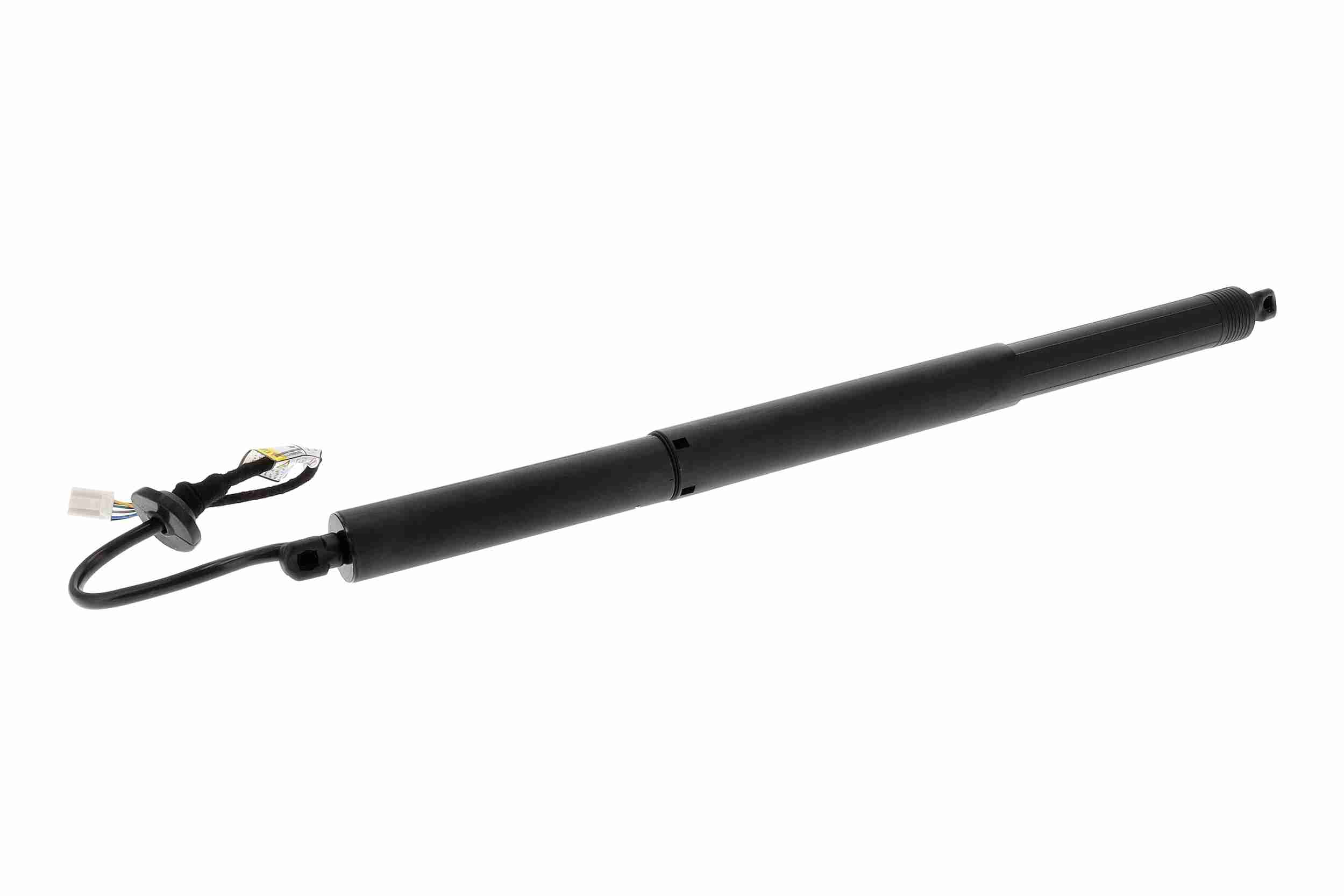 VEMO Elmotor, bagklap v58550007 bagved til venstre for TESLA
